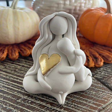 The Divine Nurturer: The Mama Goddess with child and pregnant belly